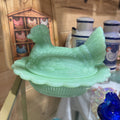 Jade mosser hen on a nest