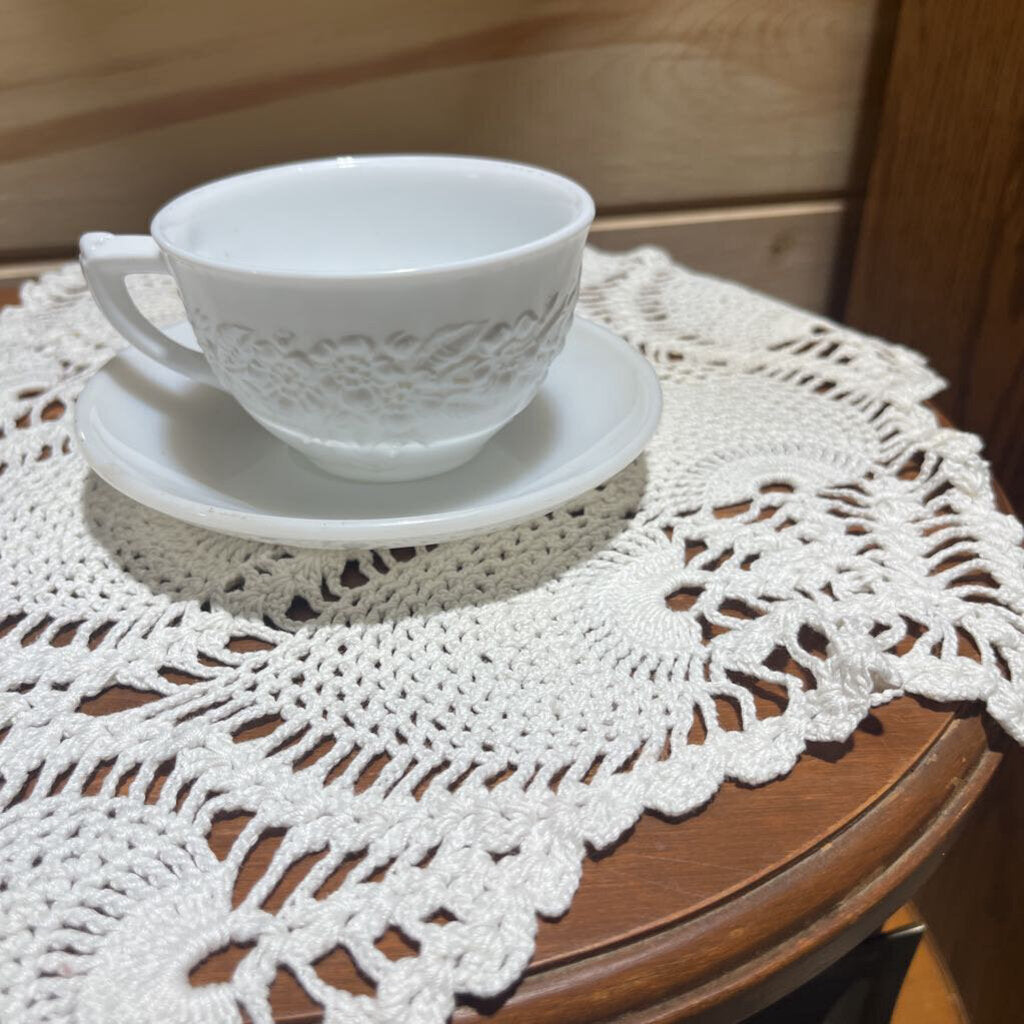 Milk glass cup and saucer