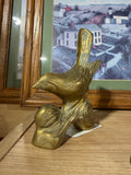 Brass Songbird on Branch