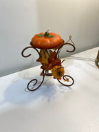 decorative pumpkin candle and fall votive