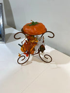 decorative pumpkin candle and fall votive