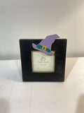 black and purple witch hat picture frame