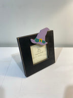 black and purple witch hat picture frame