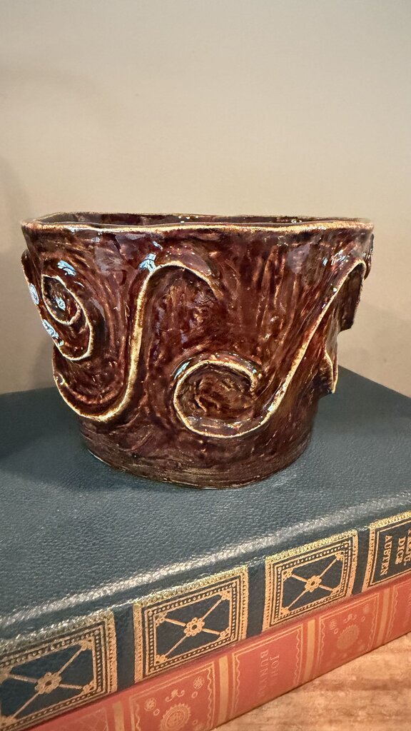 Brown Pottery Swirl Design